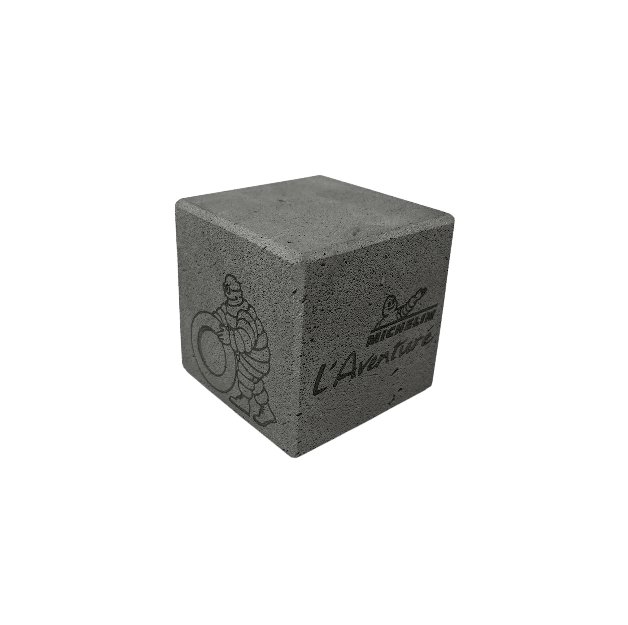 Cube in enameled lava with the Michelin Man and his tires and the signature of the l'Aventure Michelin