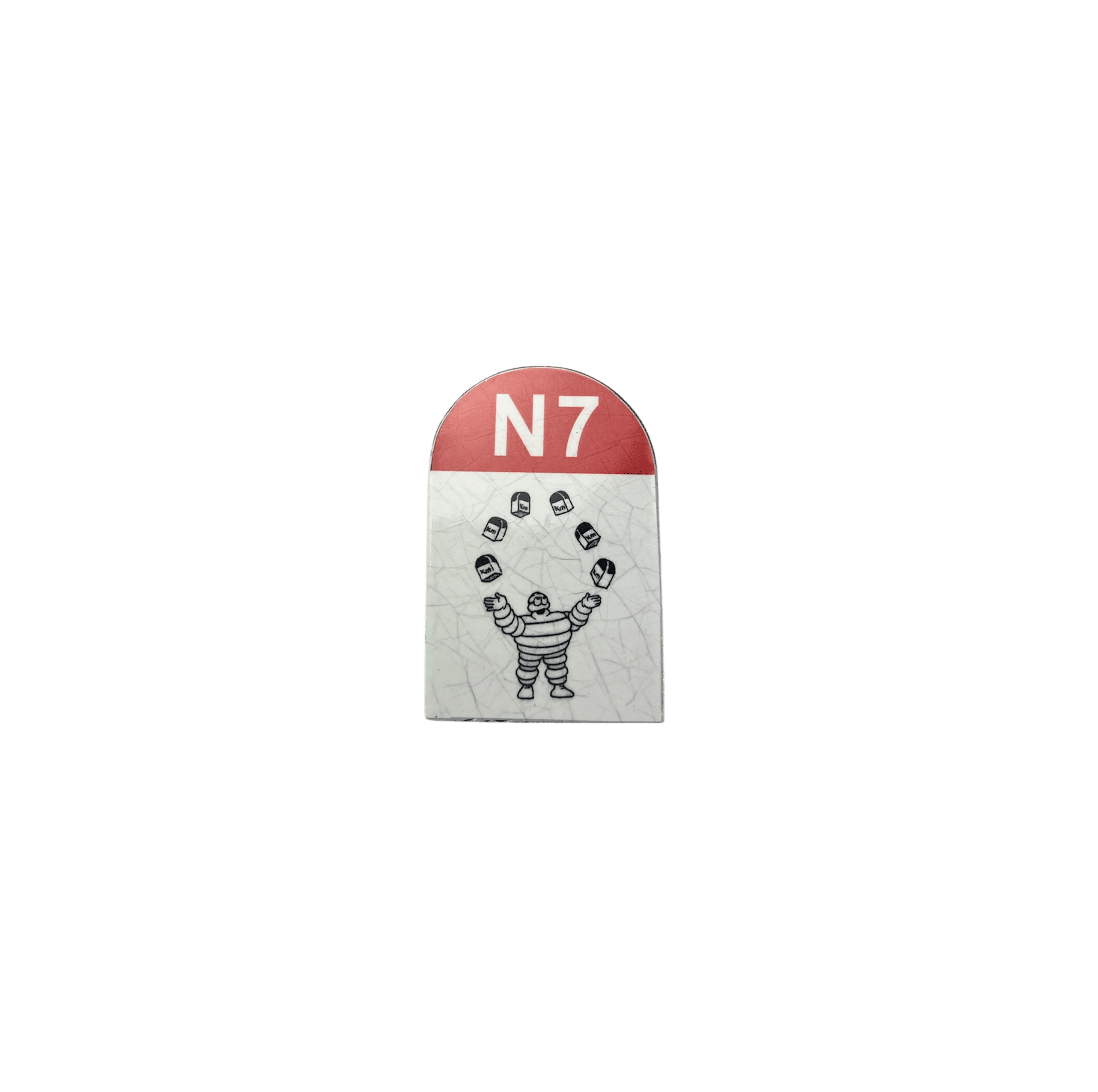 Magnet of the milestone N7 withe the Michelin Mand juggling with terminals